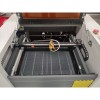 Zaiku CNC LS-6090 dengan 100 Watt Laser CO2 untuk Cutting dan Grafir